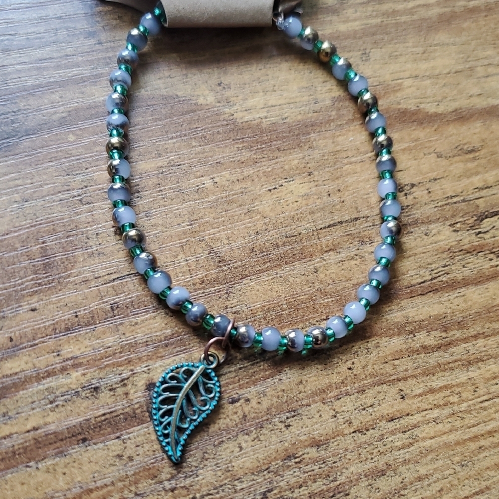 Chic Beaded Bracelet with Leaf Charm